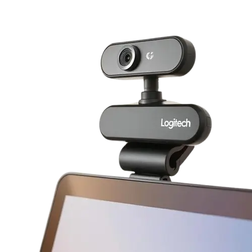 Budget webcams on a wooden desk for work from home setup in India – clip-on, tripod, and square webcam models